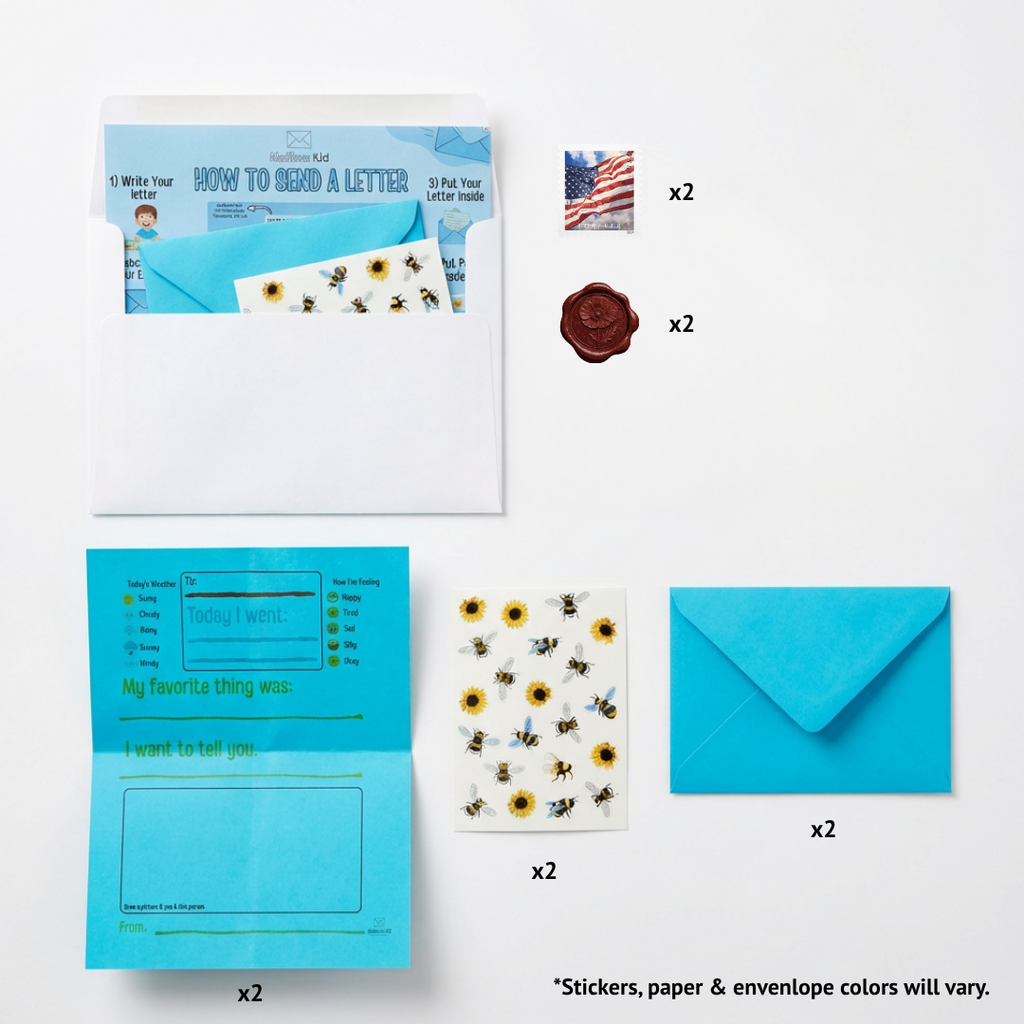 Stationery set with blue envelopes, paper, stickers, and an American flag on a white background.